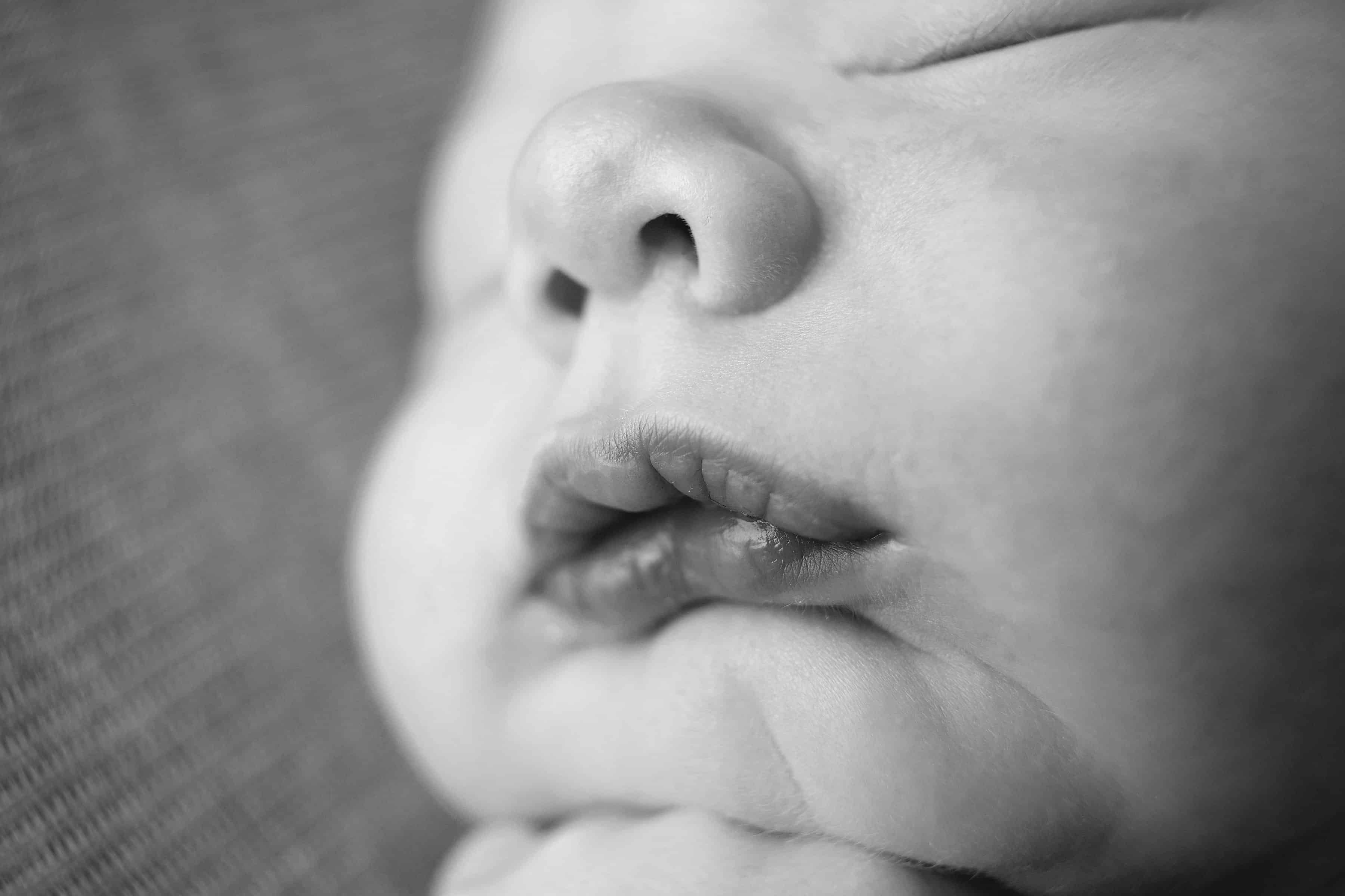 newborn baby lips and nose, breastfeeding baby