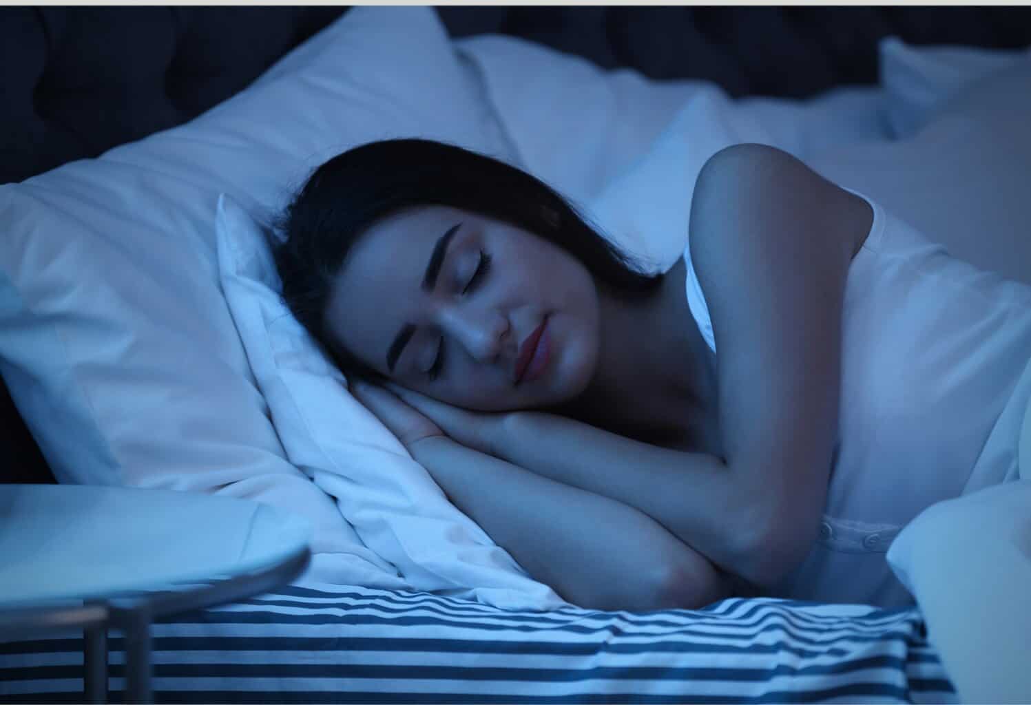 woman sleeping peacefully, essential oils sleep diffuser